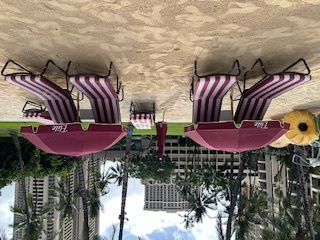 Chaise lounges and umbrella